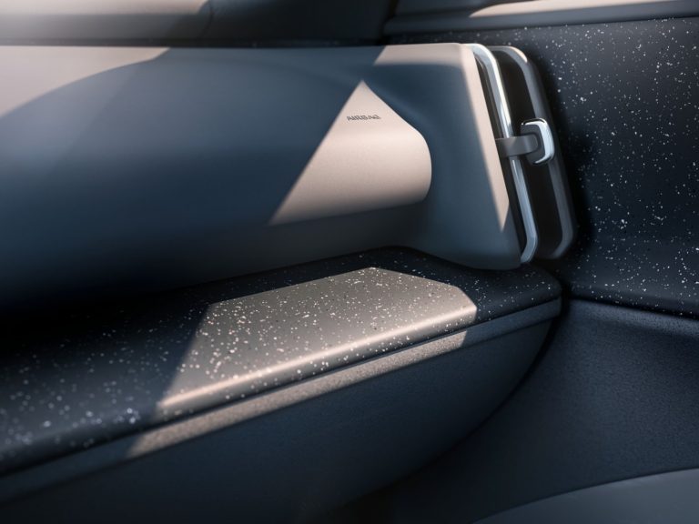 Volvo EX30 leasen - LeaseRoute - close-up van de armsteun met getextureerde bekleding