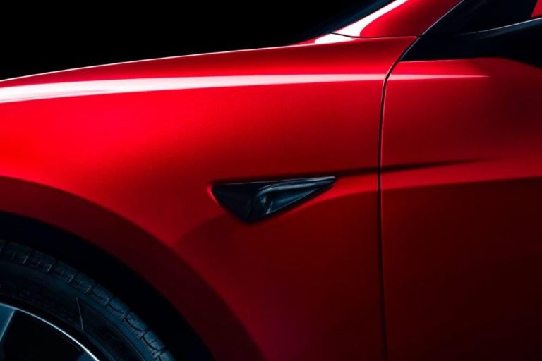 Tesla Model 3 Premium Long Range lease - zijflank met richtingaanwijzer in detail