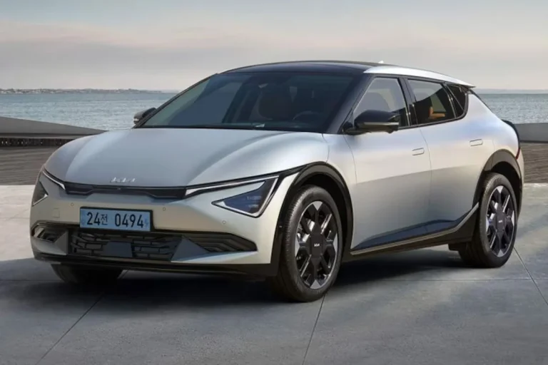 Kia EV6 leasen - schuin vooraanzicht bij een gebouw aan het water