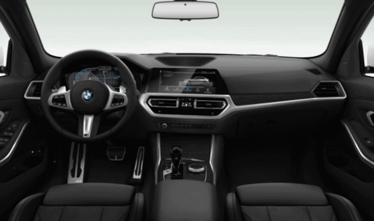 BMW M Sport Zakelijke Lease - dashboard met M-sportstuurwiel en infotainmentscherm